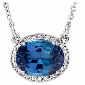 1/100 CTW Lab-Grown Emerald and Natural Diamond Oval Necklace in 14K Gold