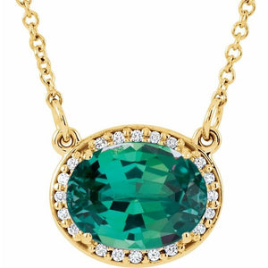 1/100 CTW Lab-Grown Emerald and Natural Diamond Oval Necklace in 14K Gold