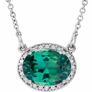 1/100 CTW Lab-Grown Emerald and Natural Diamond Oval Necklace in 14K Gold